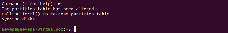 Quitting fdisk command-line utility and saving changes to the disk.