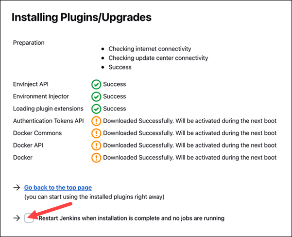 Restarting Jenkins after the plugins are downloaded. 